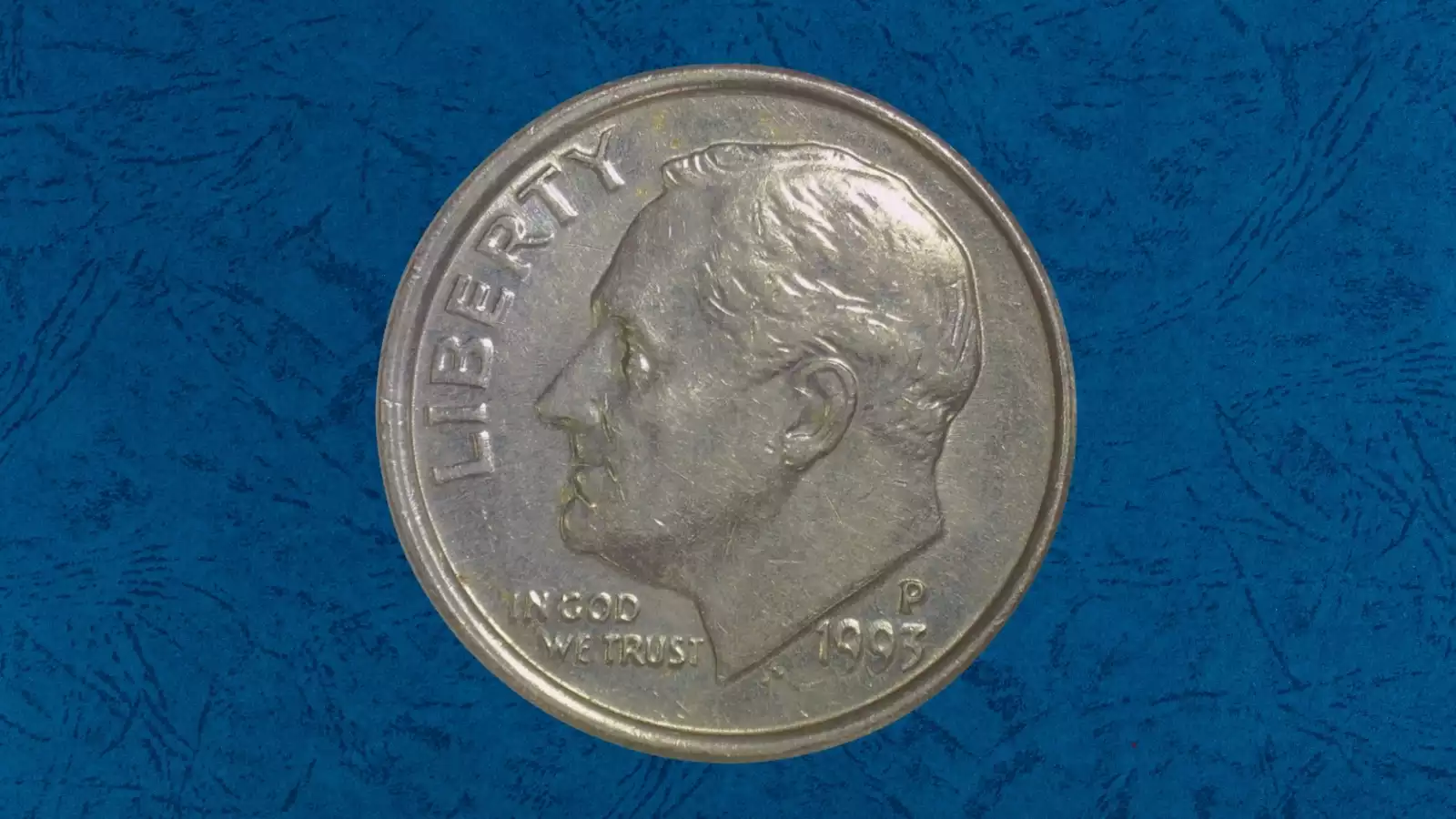 1993 dime off-center strike error showing Roosevelt portrait shifted dramatically to one side